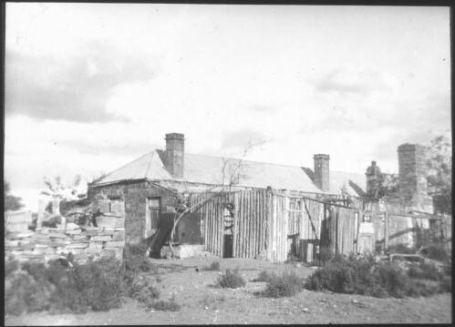 Unidentified stone cottage [transparency] : lantern slide used by Rev. F.H. Paterson, north South Australia / [John Flynn?]