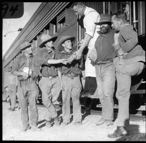 Fettlers meeting the train [transparency] : a lantern slide used in lectures on all Australian Inland Mission activities, 1940- / [John Flynn?]