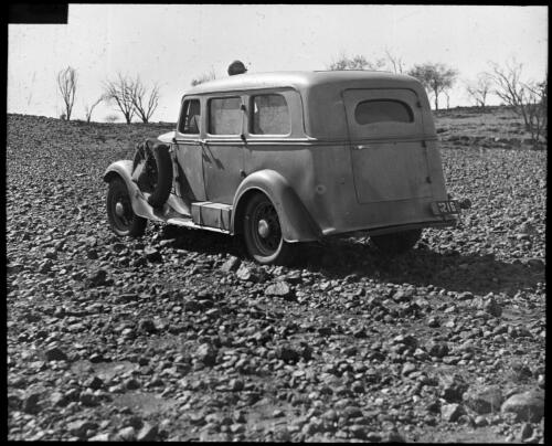 Chirs Goy's vehicle on the Birdsville Track [transparency] : a lantern slide used in lectures on all Australian Inland Mission activities, 1940- / [John Flynn?]