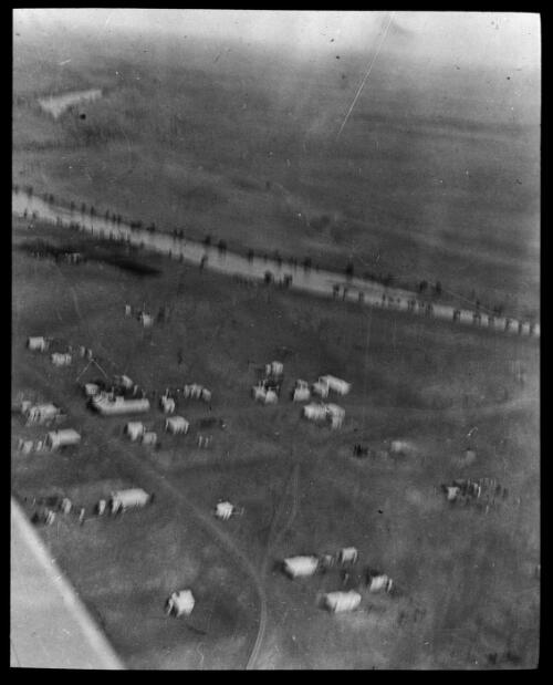 Aerial view of Camooweal, Queensland [transparency] : a deputation slide of the AIM [Australian Inland Mission] Head Office, 1926-1940/ [John Flynn?]