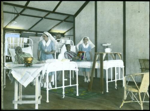Nurses tending to patients  at Fitzroy Crossing Hospital, Western Australia [transparency] / John Flynn