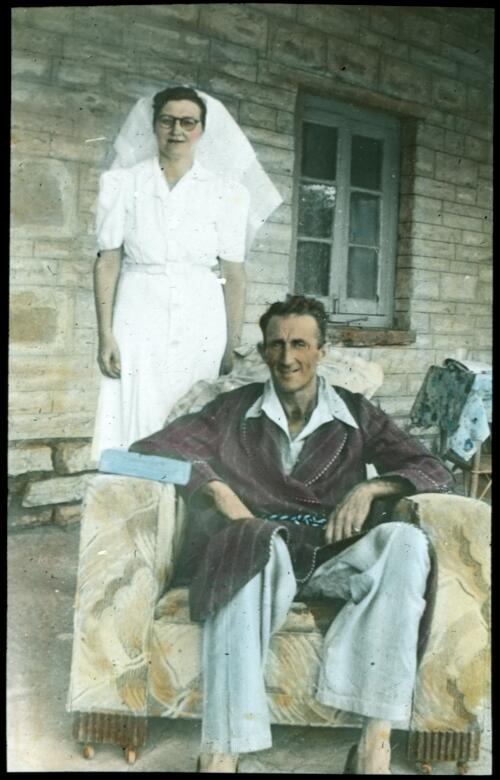 Unidentified recuperating patient with nurse [transparency] : a lantern slide used in lectures on all Australian Inland Mission activities, 1940- / [John Flynn?]
