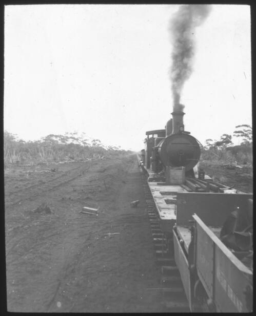 Work train, G class, Commonwealth Railways, possibly on the western end of construction line for Trans-Australia Railway [transparency] / [John Flynn?]