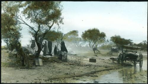 Camp by a flooded road? [transparency] : part of a mixed selection of lantern slides and negatives from John Flynn's teaching days in Gippsland, and early AIM [Australian Inland Mission] activities / John Flynn