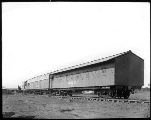 Hospital car, construction train parked in a siding [transparency] : part of mixed selection of lantern slides and negatives from John Flynn's teaching days in Gippsland, and early AIM [Australian Inland Mission] activities / John Flynn