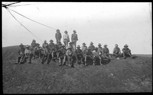 Unidentified group of men [transparency] : part of mixed selection of lantern slides and negatives from John Flynn's teaching days in Gippsland, and early AIM [Australian Inland Mission] activities / John Flynn