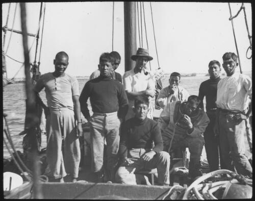 Japanese pearl divers, with Victor Kepert aboard a pearl lugger, Broome, Western Australia, ca. 1914, 1 [transparency] / [John Flynn?]