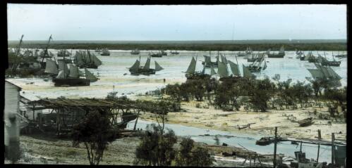 The Lay up, low tide in the creek at Broome, ca. 1914 [transparency] : a lantern slide used by John Flynn in lectures / V. Nishioka
