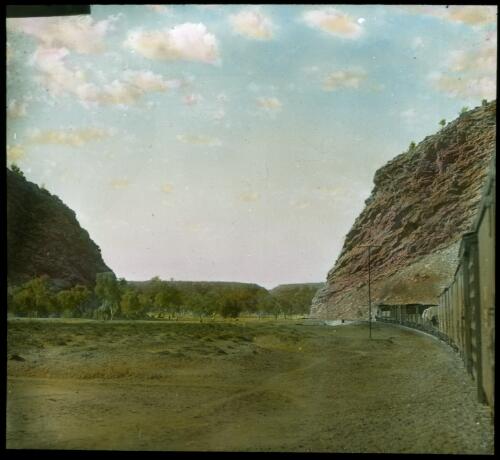 Close view of Heavitree Gap, Alice Springs [transparency] : a lantern slide used in lectures on all Australian Inland Mission activities / [John Flynn?]