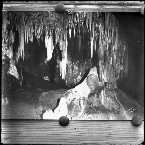 Interior of Buchan caves?, Victoria with stalactites, 2 [picture] : part of a mixed selection of lantern slides and negatives from John Flynn's teaching days in Gippsland, and early AIM [Australian Inland Mission] activities / John Flynn