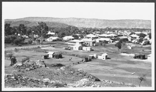 Unidentifed houses with mountain range in distance, Alice Springs, Northern Territory [?] [picture] / [John Flynn?]