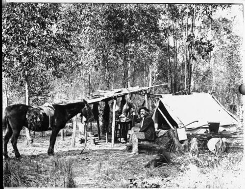 Camp of trapper [picture] : part of a mixed selection of lantern slides and negatives from John Flynn's teaching days in Gippsland, and early AIM [Australian Inland Mission] / John Flynn