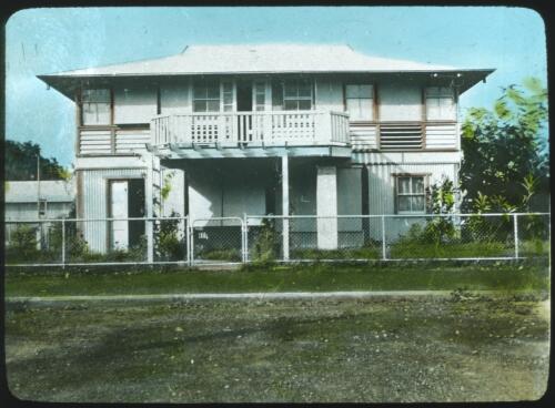 Unidentified two storey building, Darwin, Northern Territory [transparency] : a lantern slide used in lectures on all Australian Inland Mission activities / [John Flynn?]