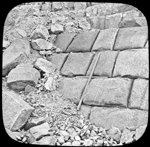 A portion of the granite casing in situ. of the Third Pyramid [transparency] / by Prof. Piazzi Smyth