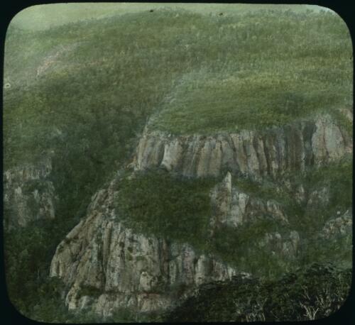 Snowy cliff [escarpment in the Snowy Mountains] [transparency] : a lantern slide from John Flynn's missionary days in Gippsland 1906-7 / John Flynn