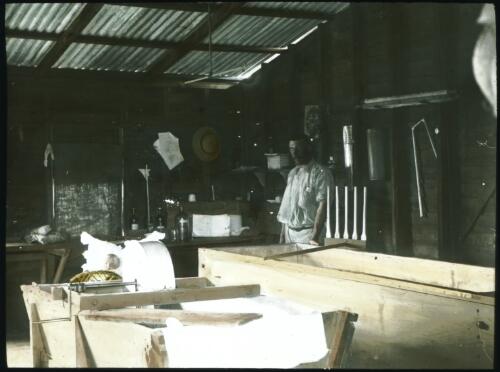 Interior of a cheese factory [transparency] : part of scenes in the Otway Ranges region of Victoria / [John Flynn?]
