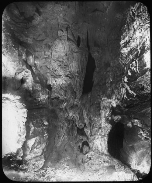 Wilson's Cave, end of Chamber [transparency] : a lantern slide from John Flynn's missionary days in Gippsland 1906-7 / John Flynn