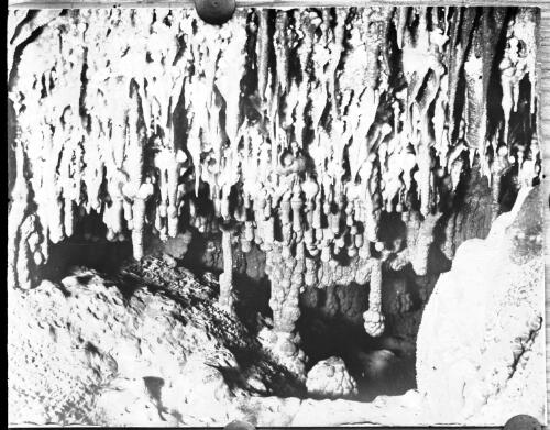 Interior of Buchan caves?, Victoria with stalactites, 3 [picture] : part of a mixed selection of lantern slides and negatives from John Flynn's teaching days in Gippsland, and early AIM [Australian Inland Mission] activities / John Flynn