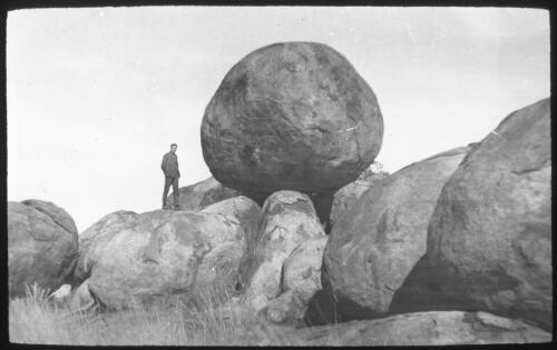 Devil's Marbles, Northern Territory [transparency] : taken on a survey trip re Flying Doctor Scheme. Rev J.A. Barber and Dr George Simpson 1927 / [John Flynn?]