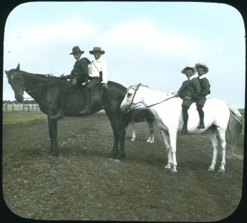 School boys sitting on horses [transparency] : a lantern slide from John Flynn's missionary days in Gippsland 1906-7 / John Flynn