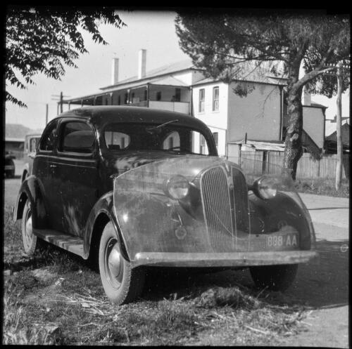[Protective guard mounted on the front of a car] [transparency] : part of a lantern slide lecture collection / [John Flynn?]