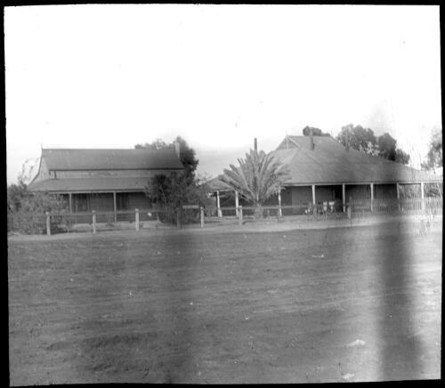 Two unidentified stone buildings [transparency] : taken during the Resonian trip to the Northern Territory led by John Flynn / [John Flynn?]