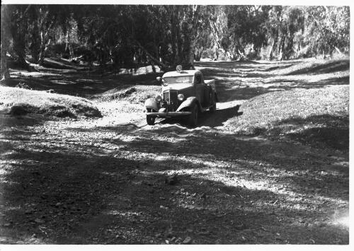 Fred McKay's truck on unidentified track in unidentified location [picture] : Alexander Kennedy Memorial ceremony 1937 / [John Flynn?]