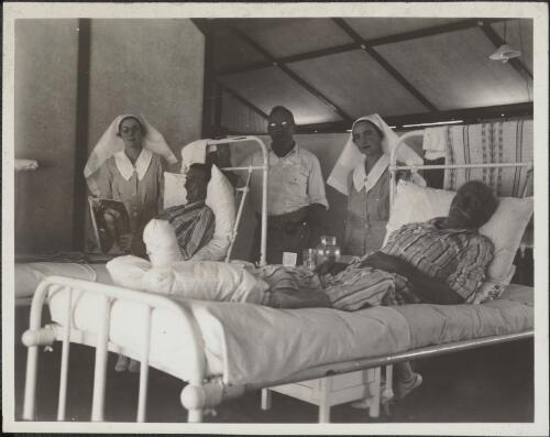 Patients and staff at Fitzroy Crossing hospital [picture] / [John Flynn?]