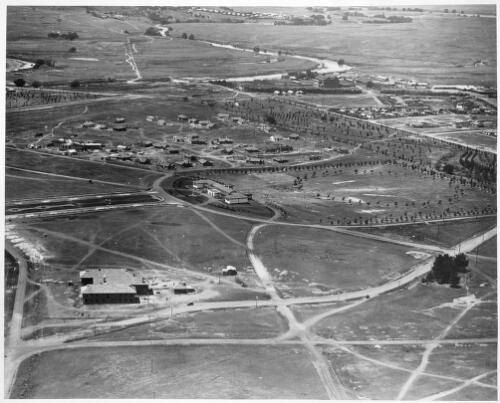 Aerial view of Telopea Park with the school in the centre and Molonglo River in the distance, Canberra, ca. 1930 [picture]