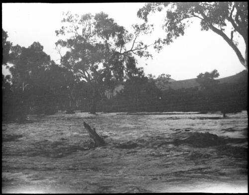 Creek in flood at Ernabella, South Australia, 1949 [transparency] / C. Duguid