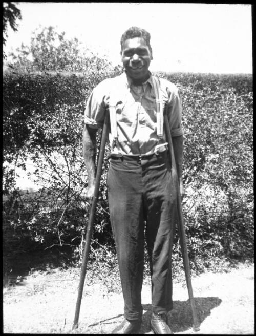 Paddy standing on crutches, South Australia, 1946 [transparency] / C. Duguid