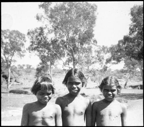 Mayawara Connelly, Nellie Patterson and Tjikalya Collins, three girls from Ernabella School, South Australia, 1946 [transparency] / C. Duguid