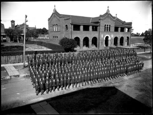 Students lined up in front of the school [picture] / A.G. Foster