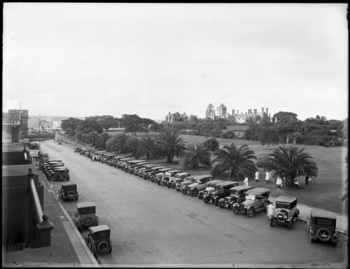 Botanical Gardens and vehicles parked on the sides of the street, Macquarie Street, Sydney, New South Wales, [1] [picture] / A.G. Foster