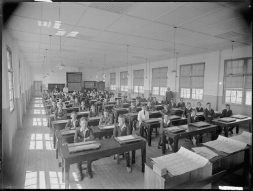 Classroom of boys seated at their desks [picture] / A.G. Foster