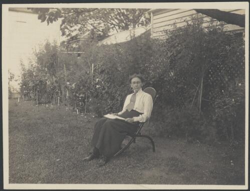 Portrait of Mathilde Elizabeth Deane with book, ca. 1910s [picture]