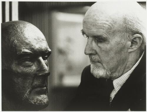 Manning Clark with bust of himself, sculpted by Ninon Geier, Canberra [picture]