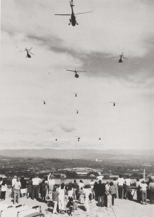Helicopters from the Defence Force fly towards the new Parliament House, Canberra, 1988 [picture] / Richard Briggs