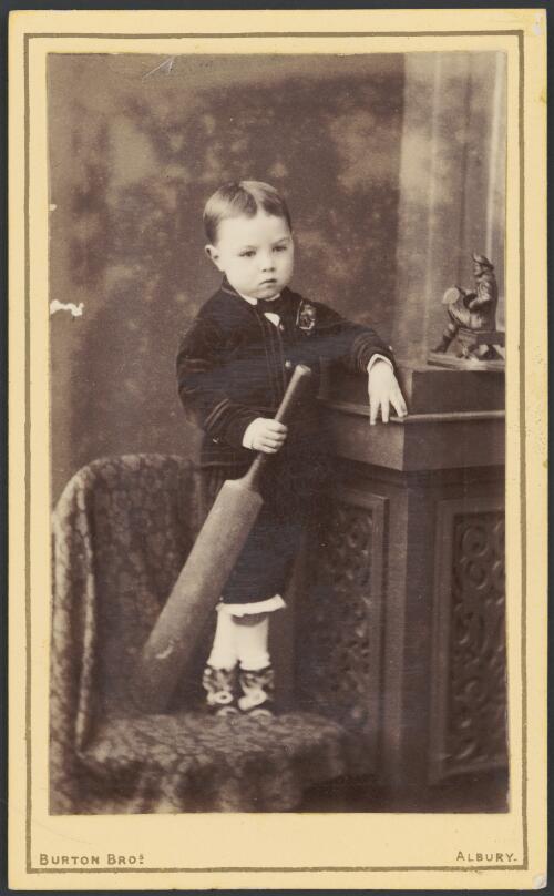 Boy toddler holding a cricket bat, Albury, New South Wales, ca. 1880 [picture] / Burton Brothers