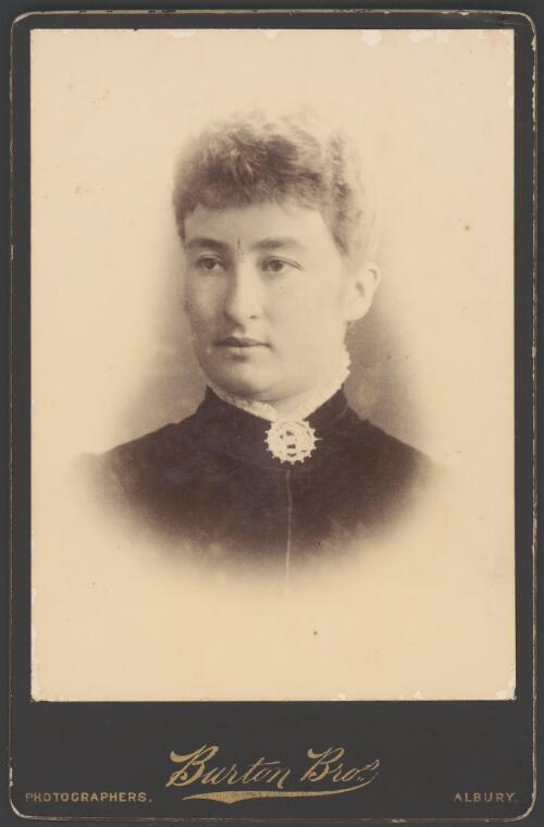 Young woman wearing a brooch, Albury, New South Wales, ca. 1880 [picture] / Burton Brothers