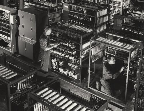 [Two men with machinery, Johns and Waygood Lifts, South Melbourne, 1965?] [picture] / Wolfgang Sievers