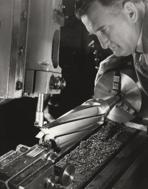 Tool and die maker with metal lathe at Sutton Tools, Melbourne, 1960, 1 [picture] / Wolfgang Sievers
