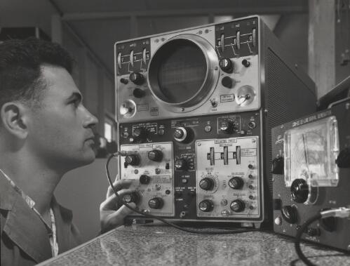 Man using electronic equipment at Electro Dynamics, Melbourne, 1962, 1 [picture] / Wolfgang Sievers