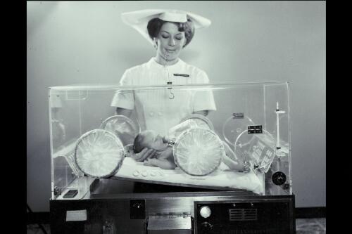 Premature baby in incubator attended by sister, Community Hospital, Echuca, Victoria, 1966 [picture] / Wolfgang Sievers