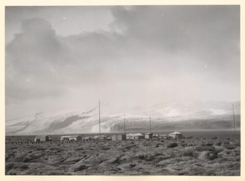 Heard Island station and the ice cliffs of the Baudessin [i.e. Baudissin] Glacier in background, Heard Island, Antarctica, 1955 [picture] / George Lowe