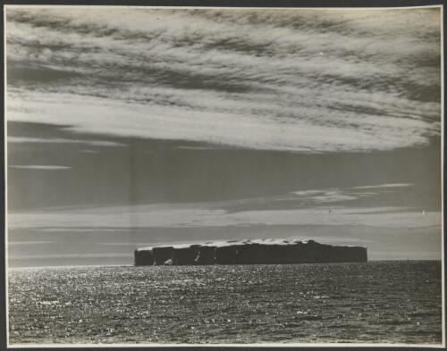 A crevassed iceberg [picture] / Frank Hurley