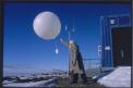 Meteorology weather forecaster Neville Martin releases the evening weather balloon which collects data of local atmospheric and weather conditions around Davis Station, Antarctica, 9 November 1997 [transparency] / Felicity Jenkins