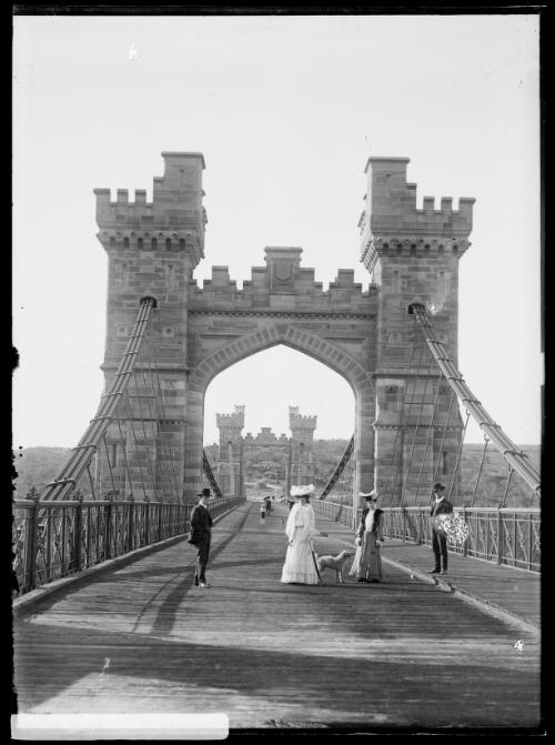 Bert Hammer, Carmen Hammer, Harold and Winifred Cazneaux standing on suspension bridge, Northbridge, New South Wales, September 1905 [picture]