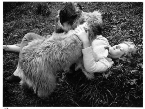 Joy Hester at Heide playing with the Reed's dogs 1943 [picture] / Albert Tucker