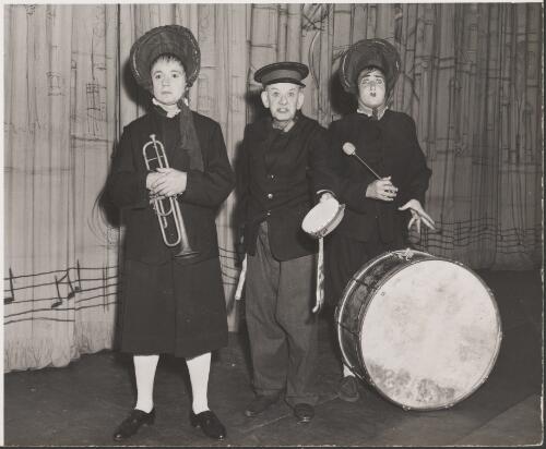 Keith Petersen, Jim Gerald and George Wallace Junior dressed as a Salvation Army band, ca. 1960 [picture] / produced by H. Williamson & Co., Sydney